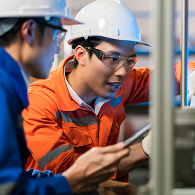 Student in hard hat doing technical training
