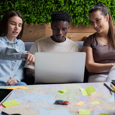 Students using AI on laptop